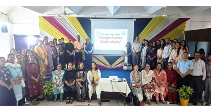 Participants posing along with school management during a programme.