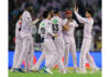 Gujarat Titans players celebrating after defeating Sunrisers Hyderabad in IPL match at Ahmedabad.