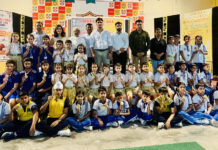 Medal winners of District Level Open Bocce Raffa Championship posing with guests.