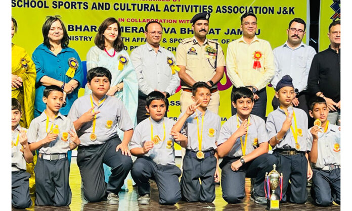 Players posing along with dignitaries during a programme.
