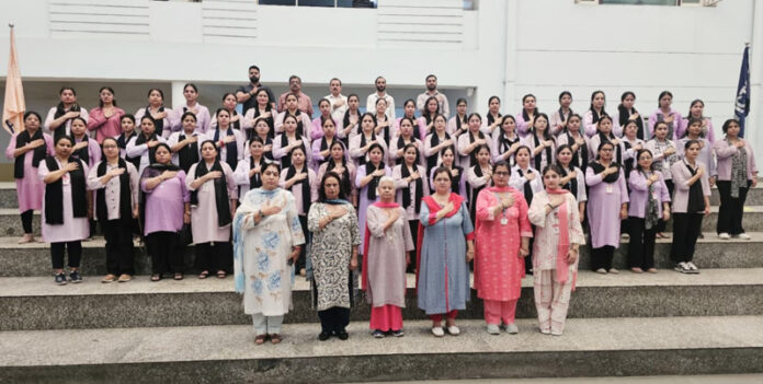 Rich Harvest School management and faculty posing during a programme. Rich Harvest School management and faculty posing during a programme.