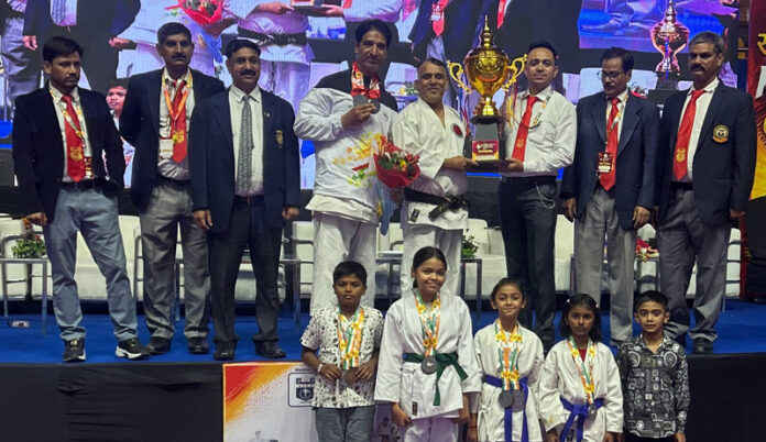 J&K Karate team posing along with trophy. J&K Karate team posing along with trophy.