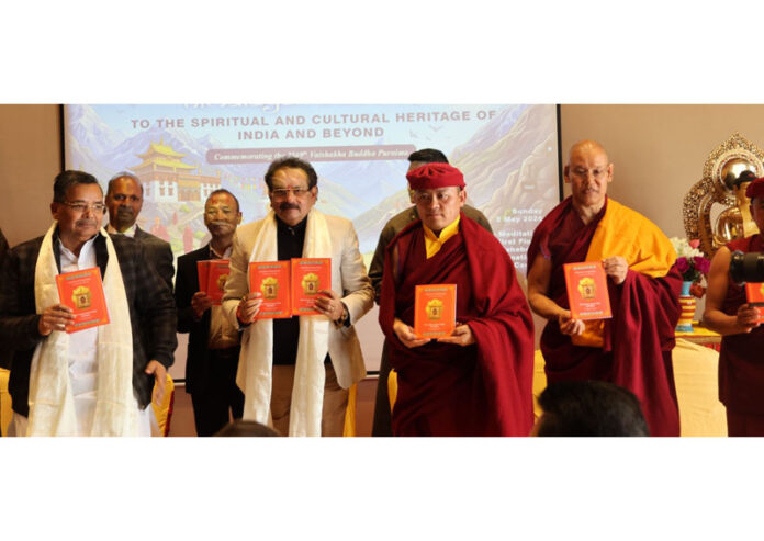 CM of Arunachal Pradesh and other dignitaries releasing a book during Intl Conference at Leh.