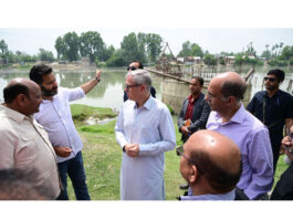 CM inspecting work on a project in Ganderbal on Sunday.