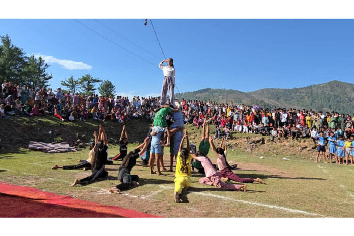 Participants presenting a yoga performance during inaugural session of Bamat Mela in Panchari area of Udhampur. Participants presenting a yoga performance during inaugural session of Bamat Mela in Panchari area of Udhampur.