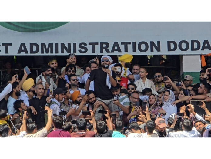 AAP MLA Mehraj Malik addressing workers and supporters at Doda on Sunday. -Excelsior/Tilak Raj