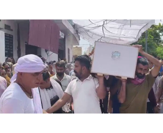The body of Ravi Kumar being taken for last rites from his native village Mehluwal in RS Pura area on Thursday.
