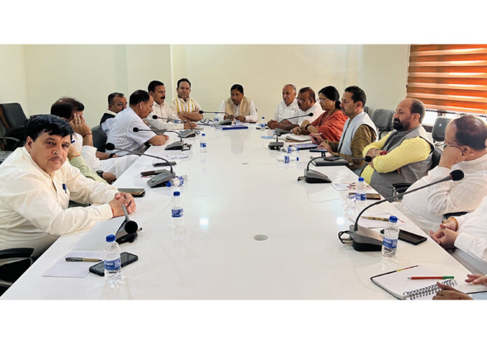 BJP leaders during a meeting at Jammu on Sunday.