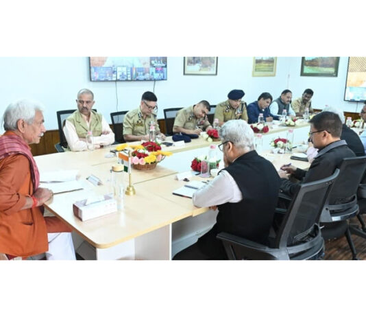 LG chairing a meeting at Srinagar on Sunday.