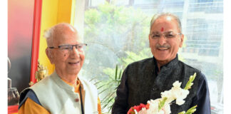 HP Governor and ex-CM exchanging greetings on Saturday.