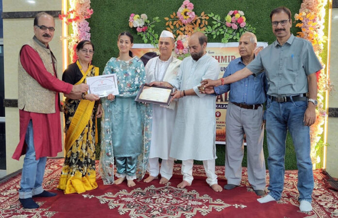 Dignitaries during a function organised by Athrot Cultural Foundation in Jammu on Saturday.