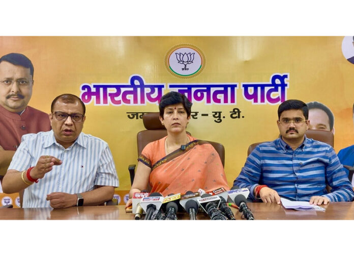 J&K BJP spokespersons Rajni Sethi, Ankit Gupta and Parimoksh Seth addressing a press conference at Jammu on Saturday.