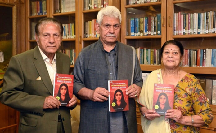 Parents of Dr Ashish Kaul presenting his book on Parmeshwari Agitation to Lt Governor J&K, Manoj Sinha . Parents of Dr Ashish Kaul presenting his book on Parmeshwari Agitation to Lt Governor J&K, Manoj Sinha .