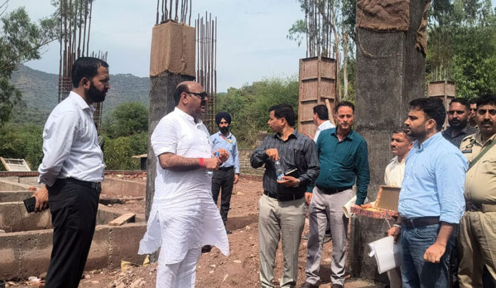 DyCM inspecting work on a project in Nowshera on Monday. DyCM inspecting work on a project in Nowshera on Monday.