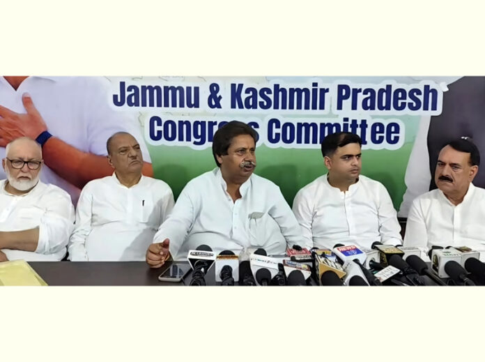 JKPCC working president Raman Bhalla flanked by others addressing press conference in Jammu. -Excelsior/Rakesh
