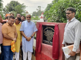 MLA Jammu North, Sham Lal Sharma laying foundation stone of drainage project in Patoli Brahmana on Monday.