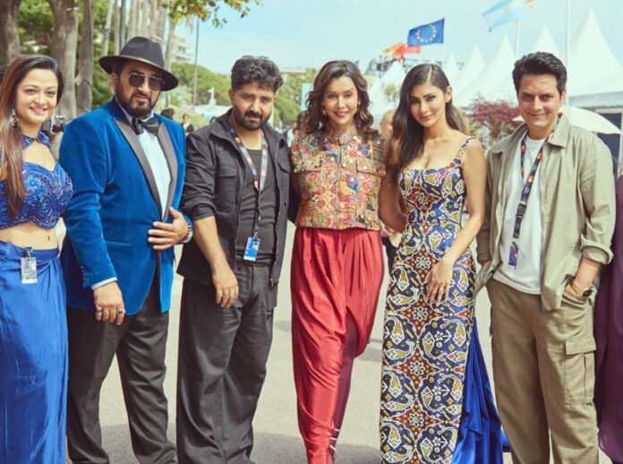 Director Tariq Khan and the lead actors of Bombay Story posing for a group photograph. Director Tariq Khan and the lead actors of Bombay Story posing for a group photograph.