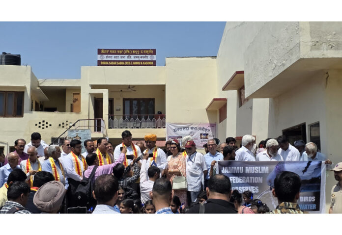 Dignitaries from DSS and Department of Forest observing 'Save Birds, Save Water Day' in Jammu on Saturday.