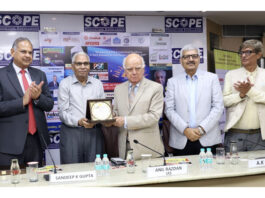 Anil Razdan, former Secretary (Power) honouring K M Prashanth and J P Sharma during a function on Friday.