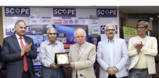 Anil Razdan, former Secretary (Power) honouring K M Prashanth and J P Sharma during a function on Friday.