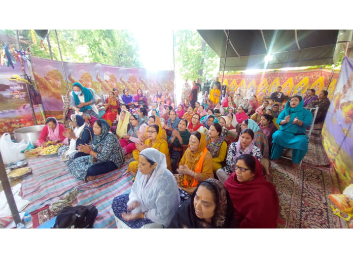 Devotees participating in Sumbali Mawas Festival. -Excelsior/Firdous Ahmad Devotees participating in Sumbali Mawas Festival. -Excelsior/Firdous Ahmad