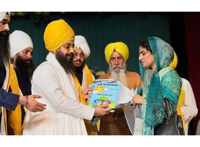 Writer Simranjit Kour being honoured during a function in Khour on Wednesday. Writer Simranjit Kour being honoured during a function in Khour on Wednesday.