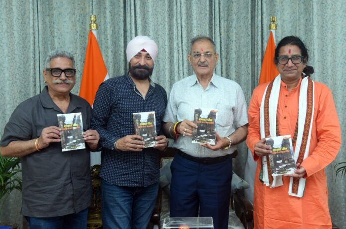 Governor of Himachal Pradesh Kavinder Gupta releasing a book on Wednesday.