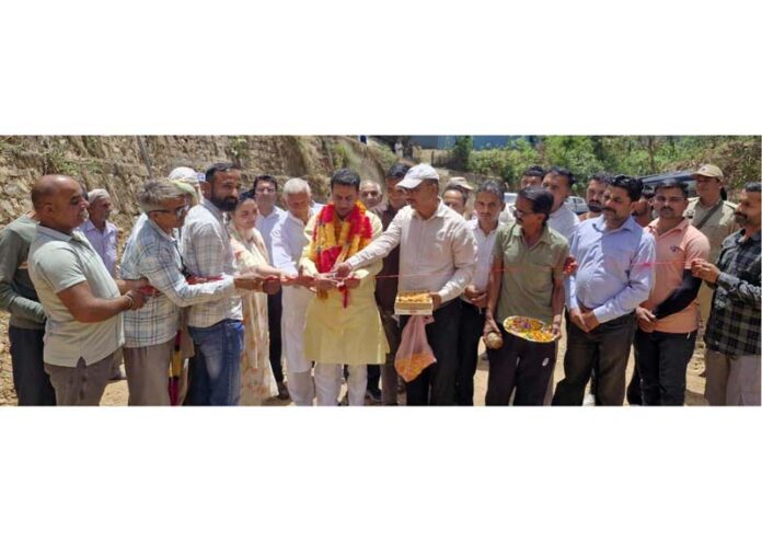 MLA Jasrota, Rajiv Jasrotia launching permanent restoration works of PMGSY roads in Hatli Zone on Friday. -Excelsior/Nishant MLA Jasrota, Rajiv Jasrotia launching permanent restoration works of PMGSY roads in Hatli Zone on Friday. -Excelsior/Nishant