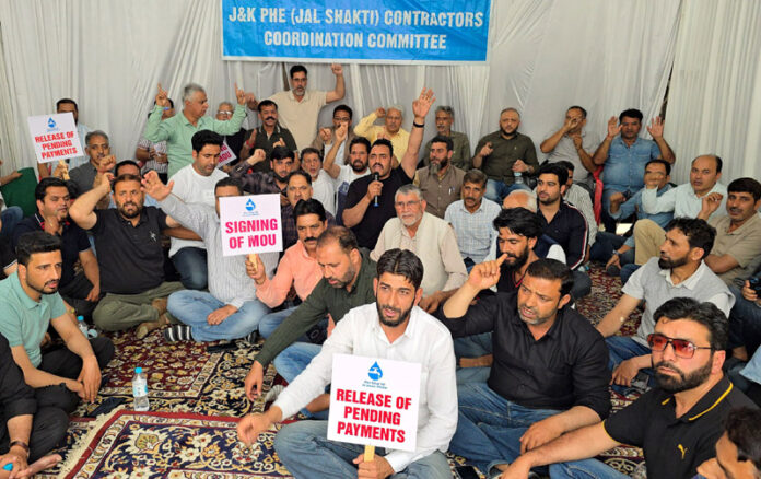Jal Shakti Deptt contractors during a protest in Srinagar on Wednesday. -Excelsior/Shakeel-ur-Rehman Jal Shakti Deptt contractors during a protest in Srinagar on Wednesday. -Excelsior/Shakeel-ur-Rehman