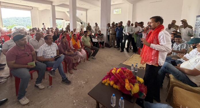 Balwant Singh Mankotia addressing a public gathering in Chenani on Saturday. Balwant Singh Mankotia addressing a public gathering in Chenani on Saturday.
