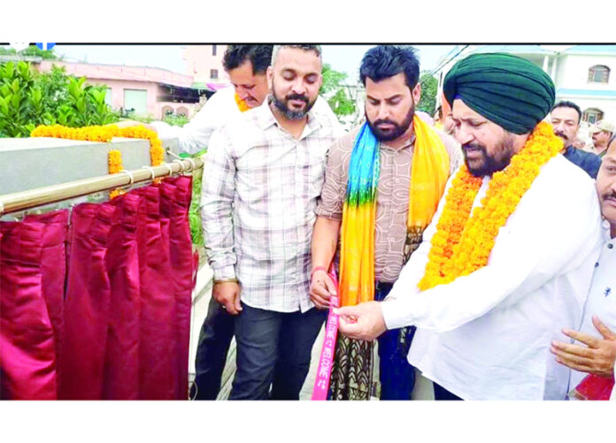 Dr Narinder Singh inaugurating developmental works in Lower Gadigarh on Sunday. Dr Narinder Singh inaugurating developmental works in Lower Gadigarh on Sunday.