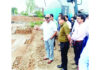 DyCM inspecting work on a project on Saturday.