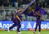 Kolkata Knight Riders players celebrating after taking a wicket during the match against Mumbai Indians.