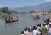 Rescue teams trying to locate bodies of drowned youth.