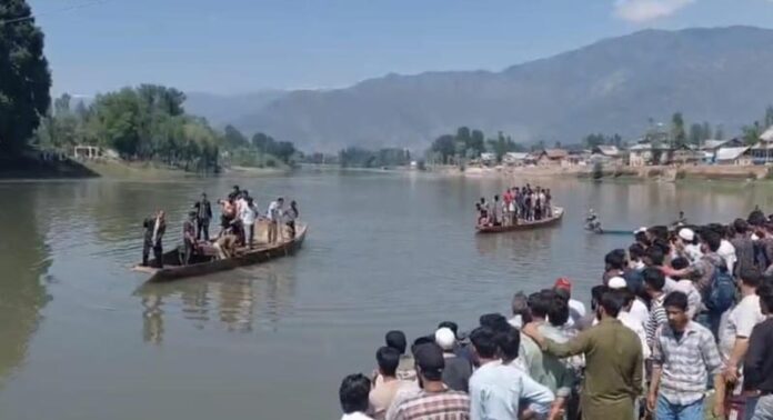 Rescue teams trying to locate bodies of drowned youth.