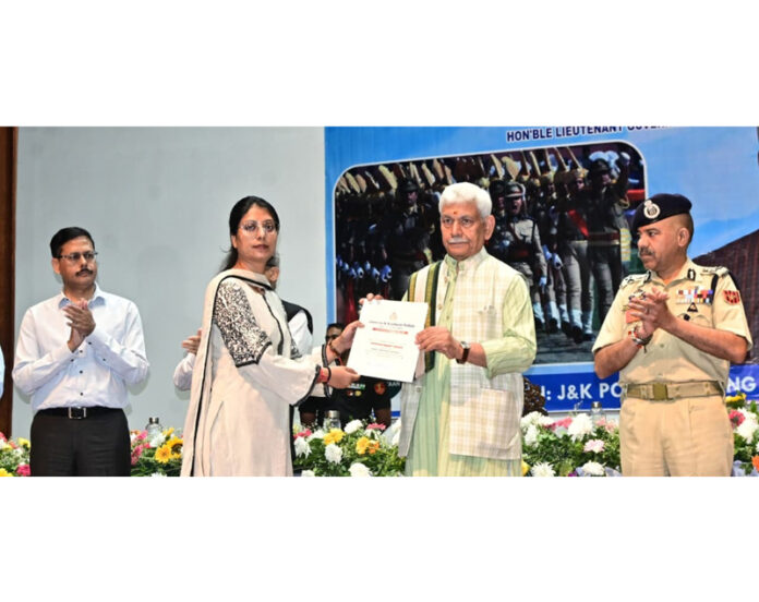 LG Manoj Sinha handing over appointment letters to newly appointed police constables. LG Manoj Sinha handing over appointment letters to newly appointed police constables.