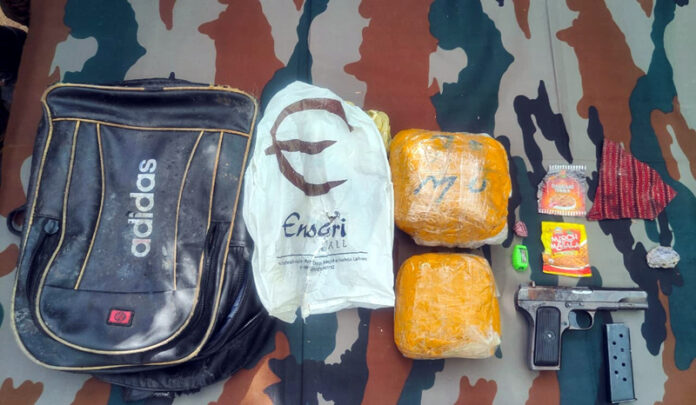 Pistol and other items recovered in Balakote. Pistol and other items recovered in Balakote.