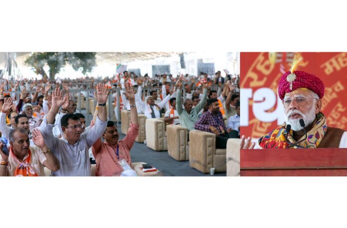 Prime Minister Narendra Modi addressing at the Somnath Amrut Mahotsav at Somnath Temple, in Gujarat on Monday. (UNI)