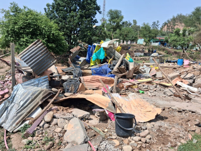 A tin structure demolished in Forest Department action at Raika Bandi area of Jammu district on Tuesday. -Excelsior/Rakesh