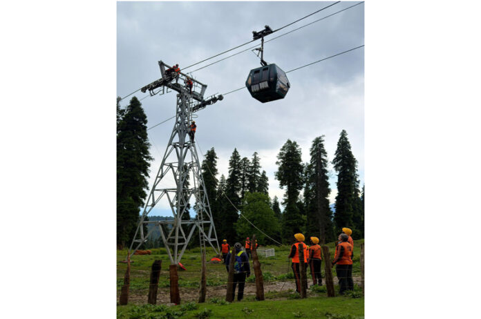 Rescue operation from cable car at Gulmarg on Monday. Rescue operation from cable car at Gulmarg on Monday.