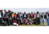 Trackers posing for a group photograph during an event.
