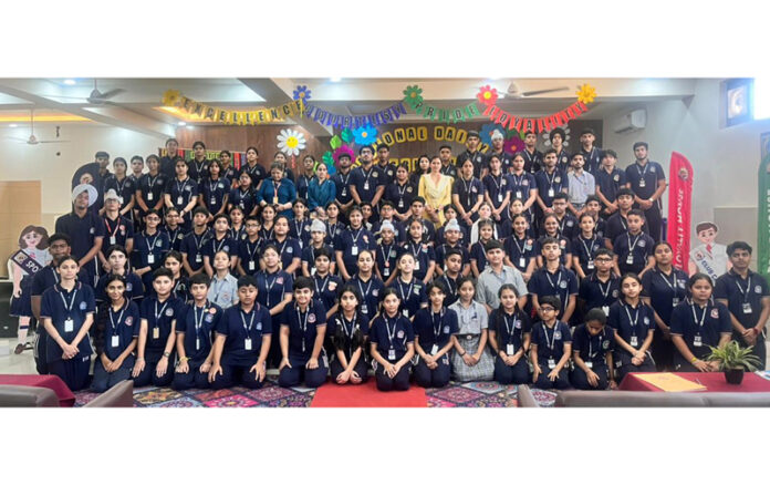 Newly elected students council posing along with dignitary and school management during a programme.