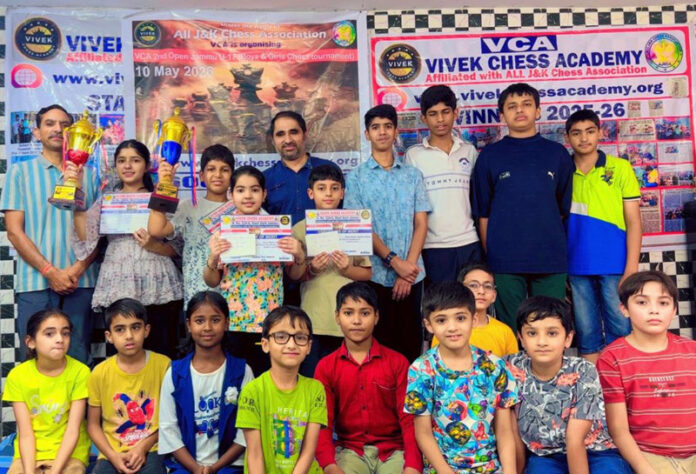 Winners posing along with certificates during a programme. Winners posing along with certificates during a programme.