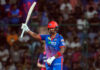 KL Rahul raising his bat after scoring 56 runs against Rajasthan Royals in New Delhi on Sunday.