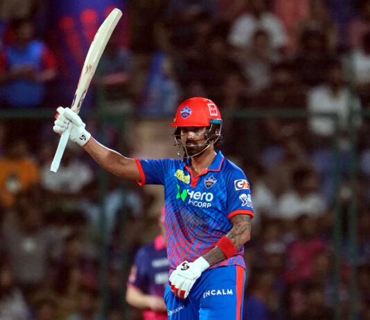 KL Rahul raising his bat after scoring 56 runs against Rajasthan Royals in New Delhi on Sunday.