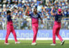 Jofra Archer celebrating with teammates after taking a wicket against Mumbai Indians in Mumbai.