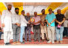 Organizers presenting a memento to the chief guest during semifinals of the Akhnoor Football Cup.