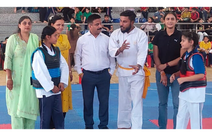 Officials and players of Indoor Stadium, Jammu.