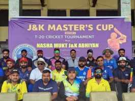 Players and dignitaries posing during inaugural event.