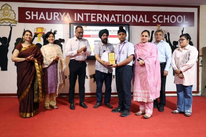 Dr Narinder Singh Raina, MLA, RS Pura, felicitating a student during a programme. Dr Narinder Singh Raina, MLA, RS Pura, felicitating a student during a programme.